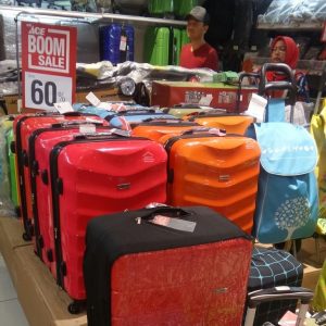 membeli koper Passport Pet+ dengan harga diskon